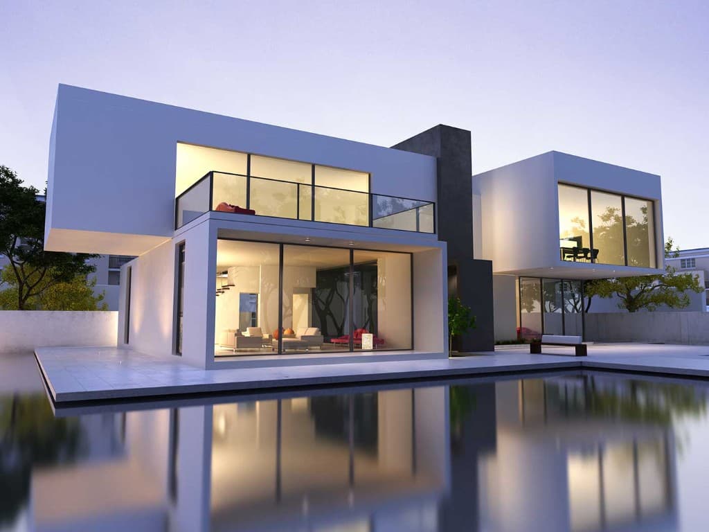 Modern two-story luxury villa at dusk with floor-to-ceiling glass and still pool reflecting warm interior light